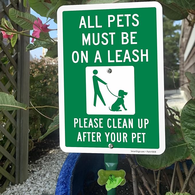 SmartSign Pets Must Be On Leash Clean Up After Pet Yard Sign & Clip-On Dispenser Combo/Kit, 7"x10" Rust-proof Metal Sign with 18-inch Steel Stake, Compact Dispenser Preloaded with a 15 Poop Bags Roll